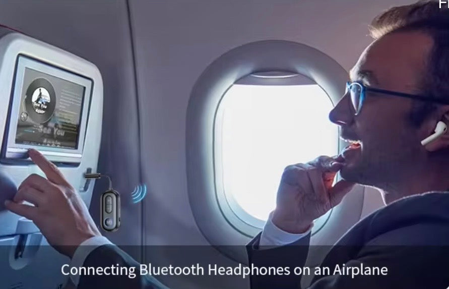 Airplane Bluetooth Transmitter.  Use your own headphones on the plane.